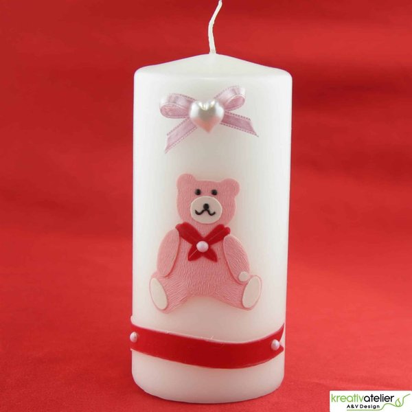 weiße Kerze zur Geburt mit rosanem Bärchen