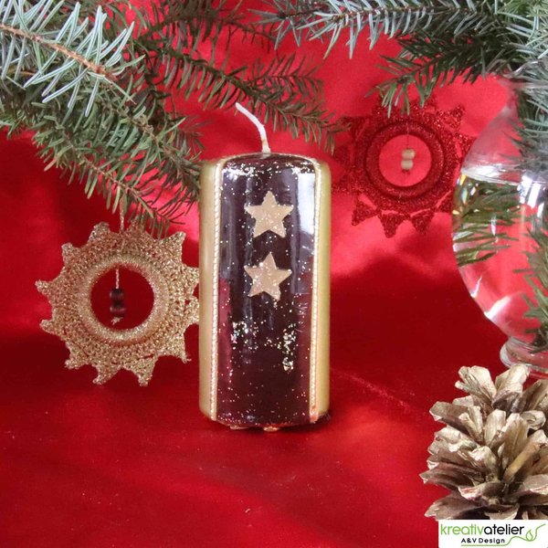 kleine goldene Weihnachtskerze, braun verziert mit Sternen